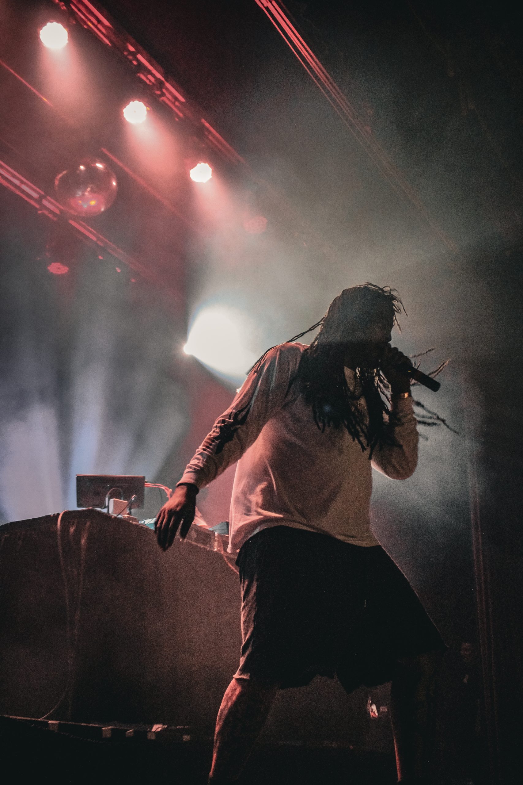 Waka Flocka Flame singing into microphone